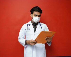 a doctor holding a tablet