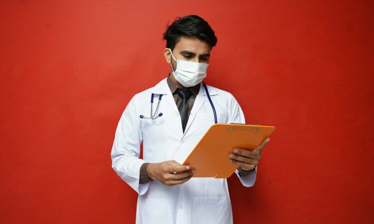 a doctor holding a tablet